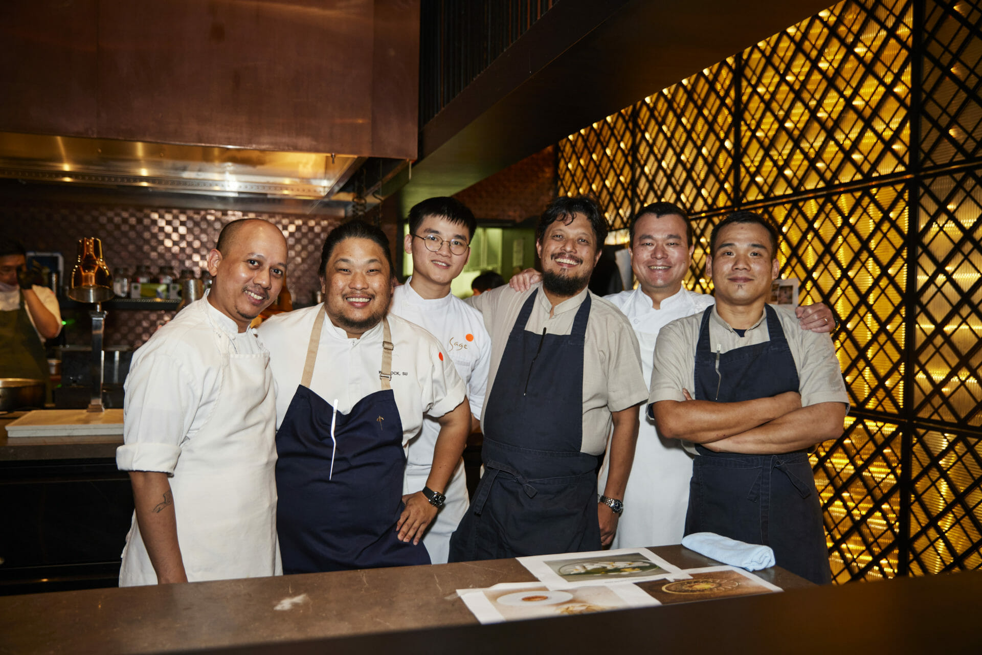 chefs from 7 different restaurants got together to present the launch dinner