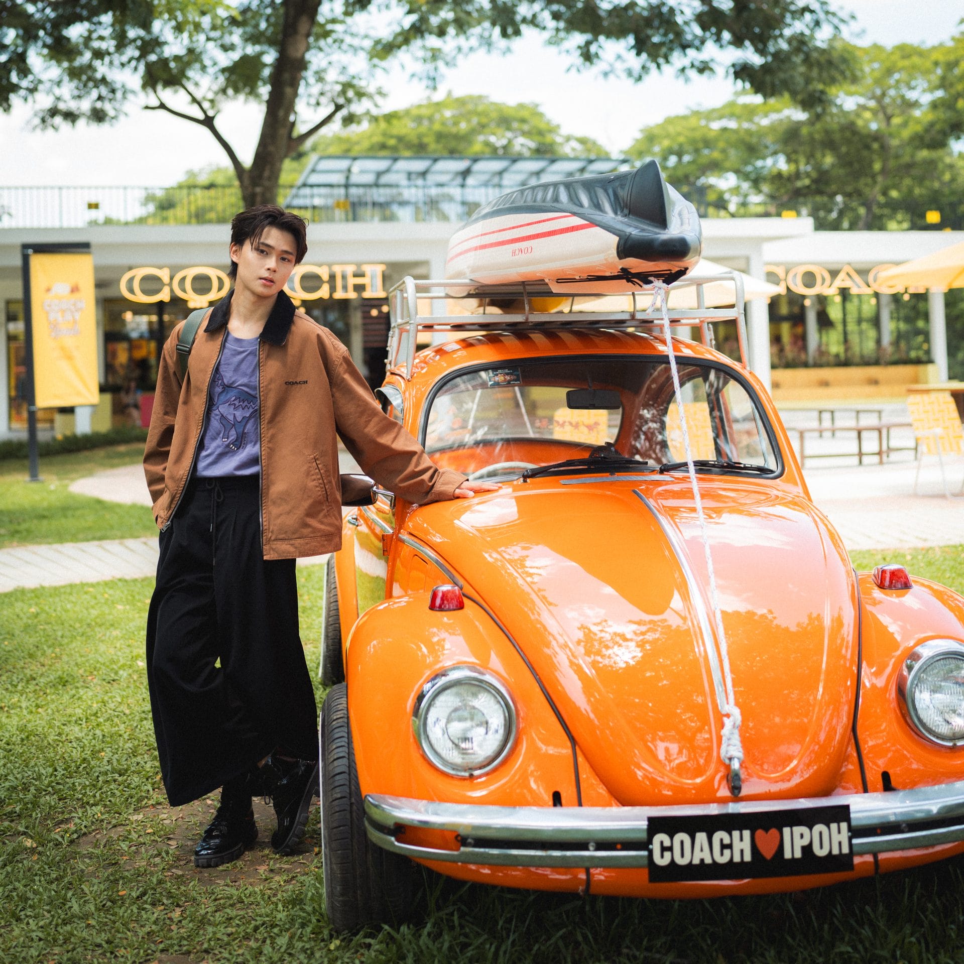 jia song posing with the vintage car 1