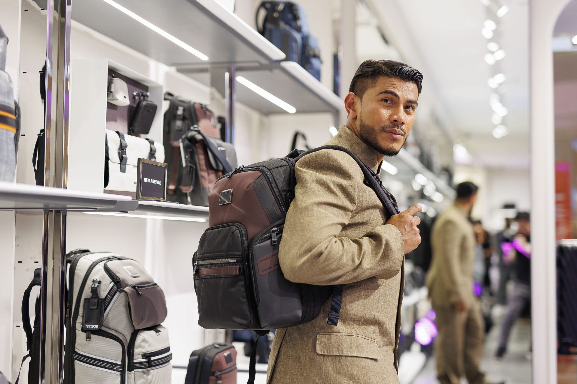 fw24 collection azrel ismail with tumi alpha bravo navigation backpack in oxblood