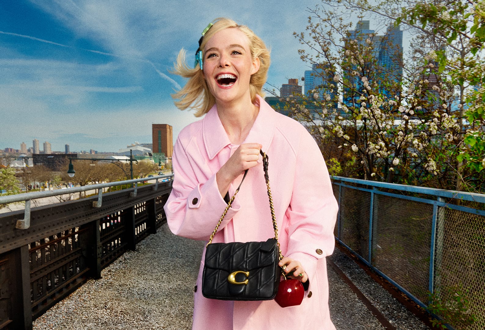 elle fanning coach unlock your courage times square tabby