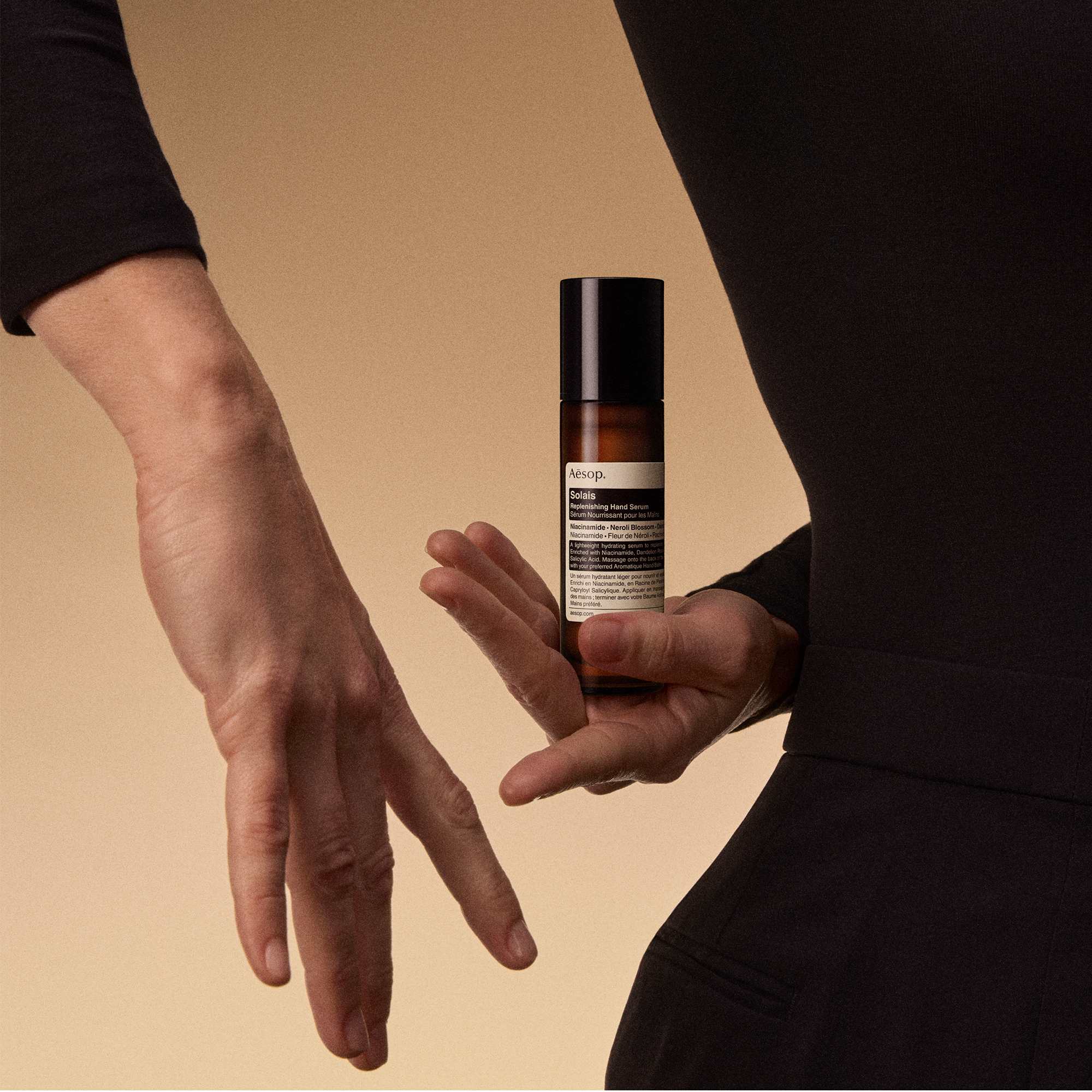 aesop solais replenishing hand serum model shot 15