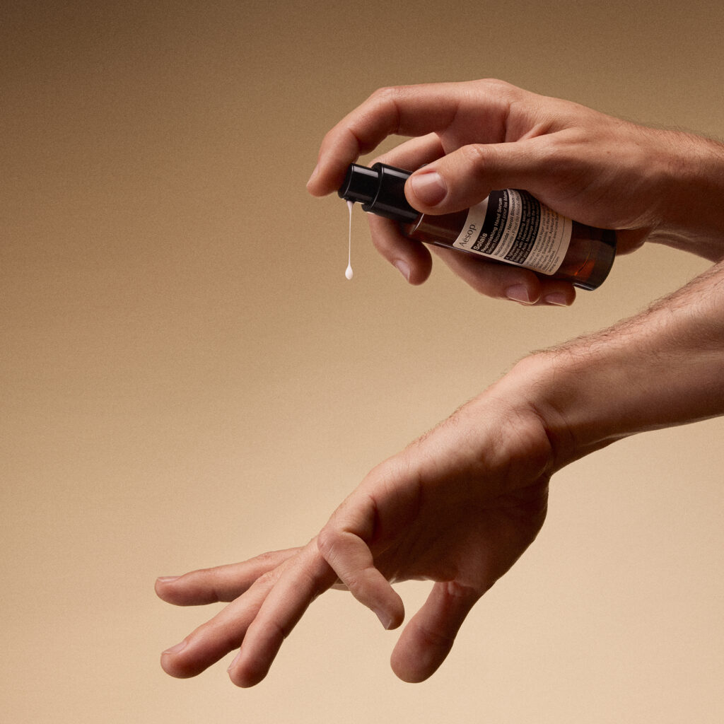 aesop solais replenishing hand serum model shot 21