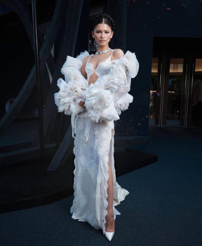 zendaya wearing custom louis vuitton by nicolas ghesquière for the odyssey premiere in paris.the